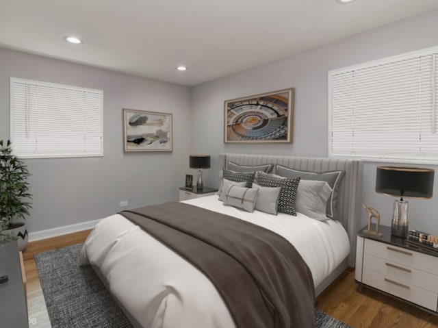 bedroom featuring dark hardwood / wood-style floors