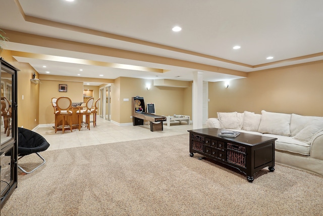 carpeted living room featuring bar