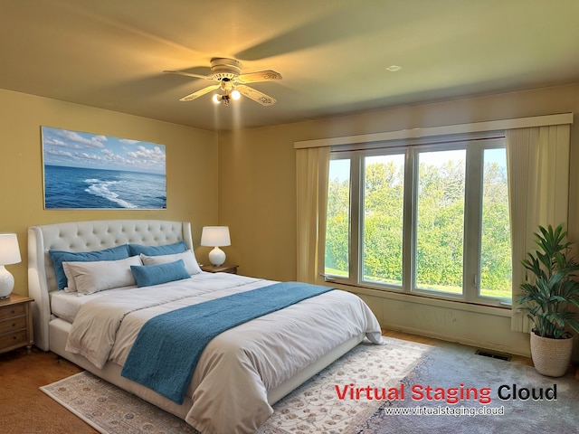 bedroom with carpet flooring and ceiling fan