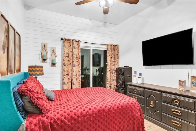 bedroom with light hardwood / wood-style flooring and ceiling fan