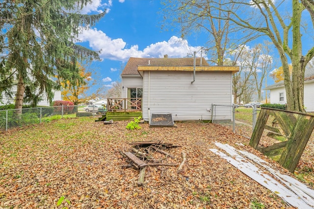 rear view of property with a deck