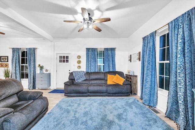 living room with ceiling fan and light hardwood / wood-style floors