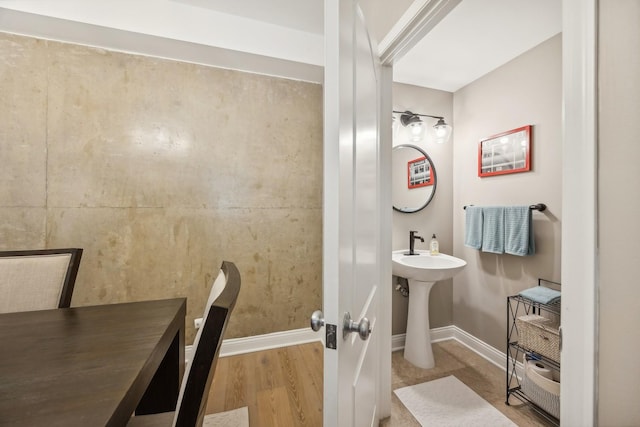 bathroom with wood-type flooring