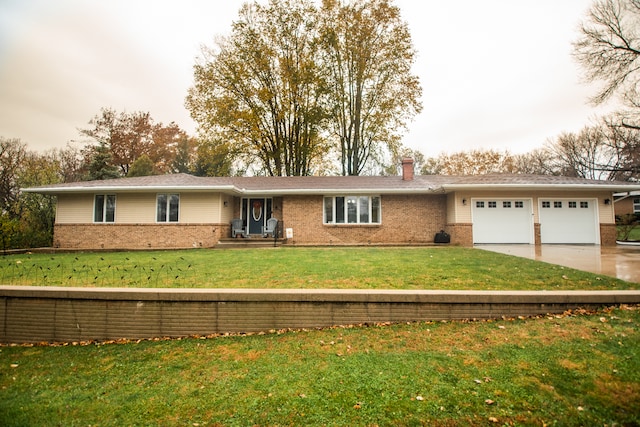 single story home featuring a front yard and a garage