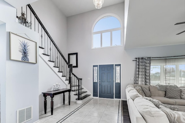 foyer with light tile patterned floors