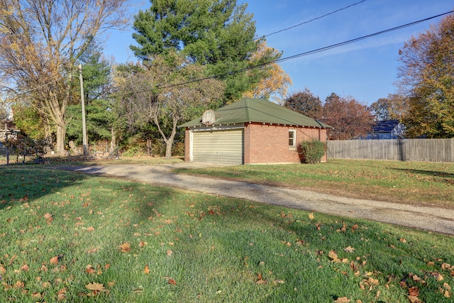 view of yard featuring a garage