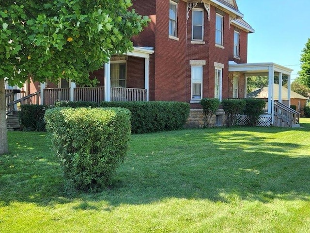 view of property exterior with a lawn