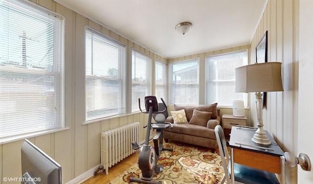 sunroom / solarium with radiator and a wealth of natural light