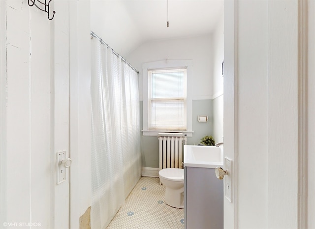 full bathroom featuring shower / bath combo, toilet, vaulted ceiling, radiator, and vanity