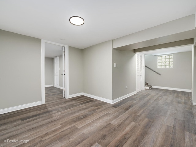 basement featuring dark hardwood / wood-style floors