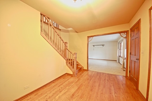 unfurnished bedroom with carpet flooring, multiple closets, and ceiling fan