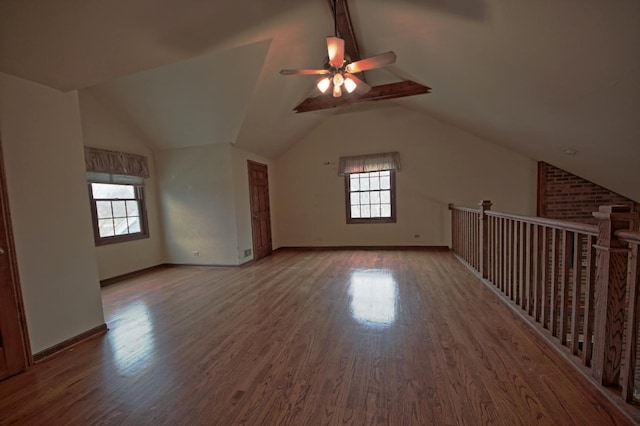 bonus room featuring lofted ceiling, ceiling fan, and wood-type flooring