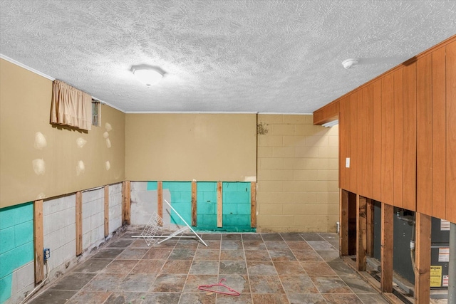 interior space with a textured ceiling