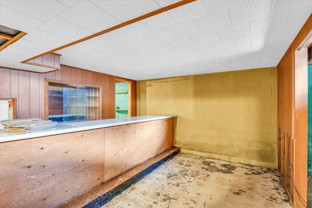 bar featuring wooden walls