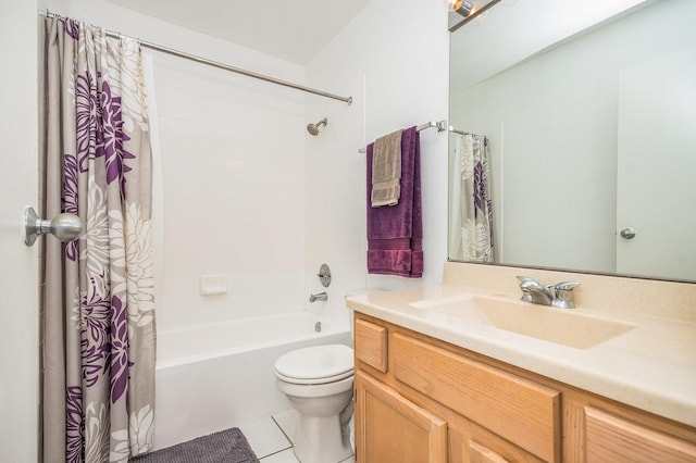 full bathroom featuring vanity, toilet, tile patterned flooring, and shower / bath combo