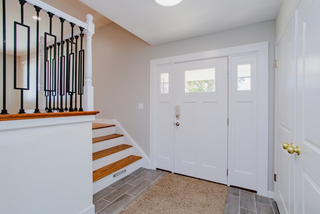 foyer with wood-type flooring