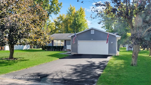 single story home with a front yard and a garage