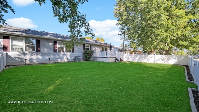 view of yard featuring central AC