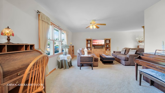 living room featuring carpet floors and ceiling fan