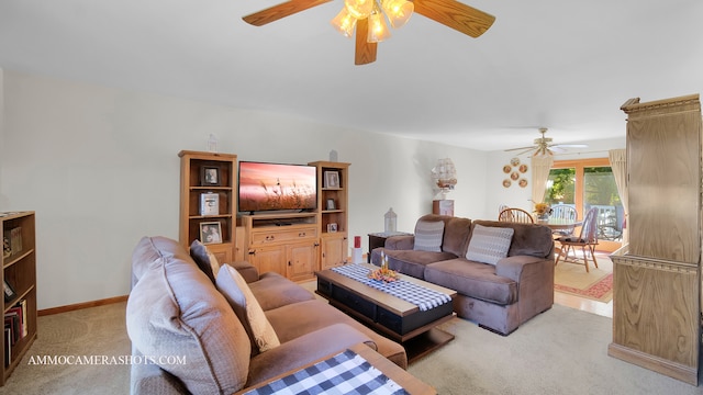 living room with light carpet and ceiling fan