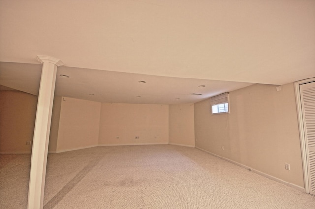 basement with light colored carpet