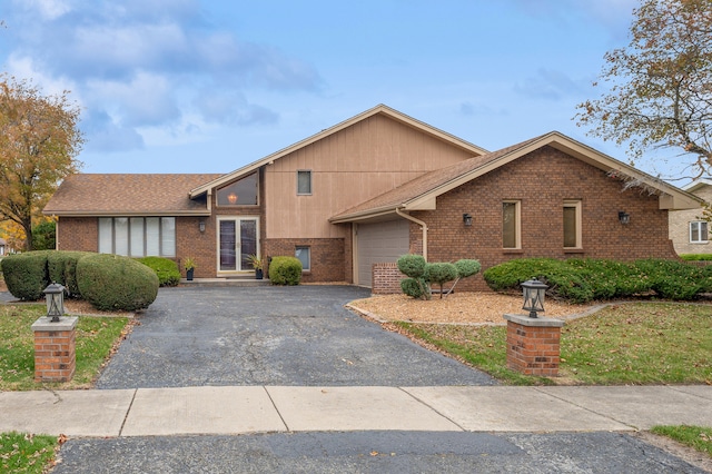 view of front of property with a garage