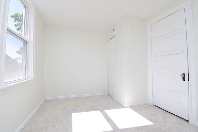 empty room with light carpet