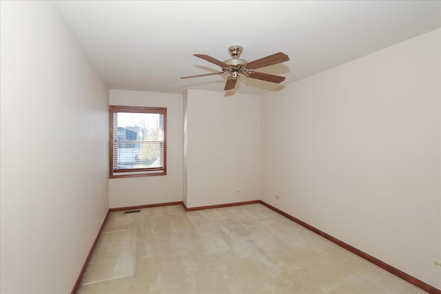 bathroom featuring tile patterned floors, vanity, and toilet