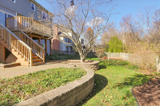 view of yard with a deck