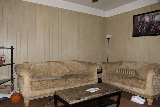 living room with wooden walls