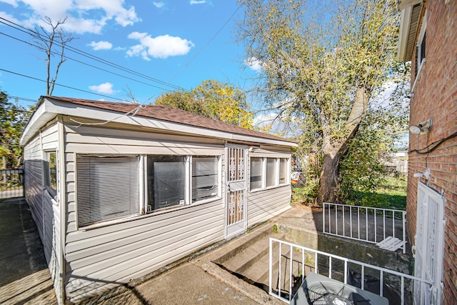 8916 S Eggleston Ave, Chicago, IL 60620 - view of home's exterior with roof with shingles