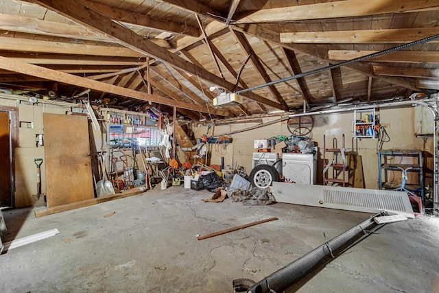 8916 S Eggleston Ave, Chicago, IL 60620 - garage with a garage door opener and a workshop area