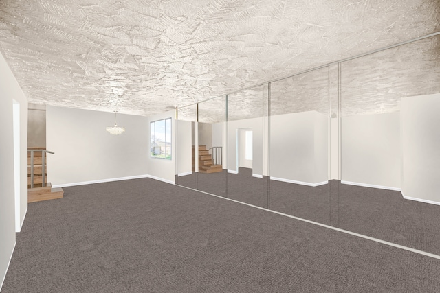 8916 S Eggleston Ave, Chicago, IL 60620 - basement featuring stairs, a textured ceiling, dark colored carpet, and baseboards