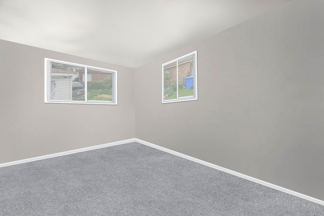 empty room with carpet flooring