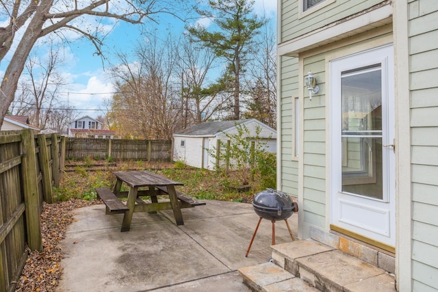 view of patio / terrace with an outbuilding