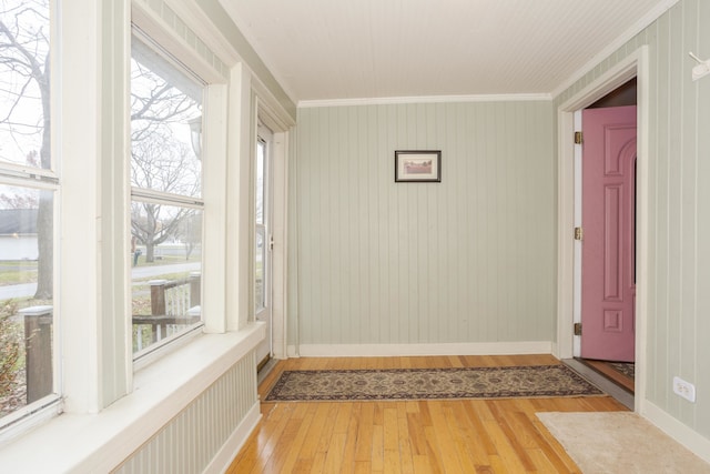 unfurnished sunroom featuring plenty of natural light