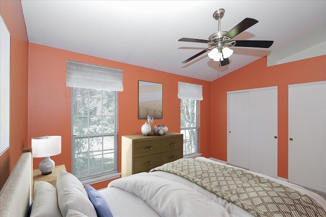 bedroom featuring ceiling fan and vaulted ceiling