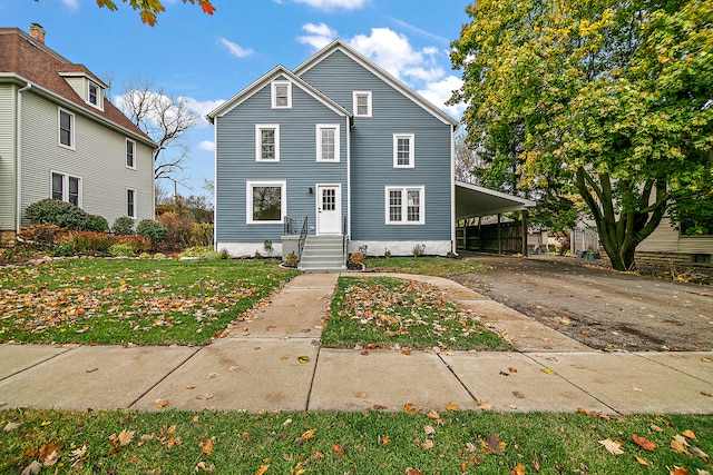 front of property with a carport