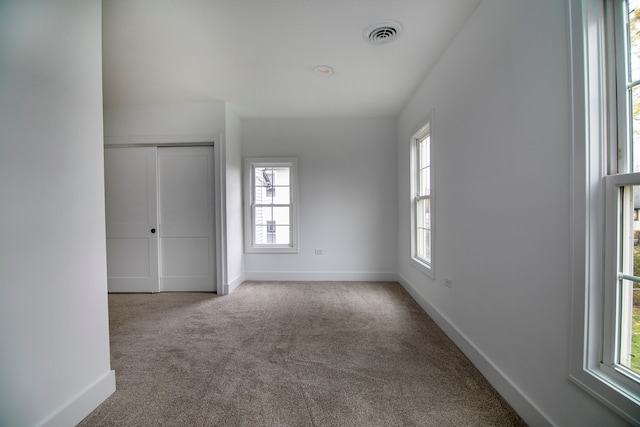 empty room with light carpet