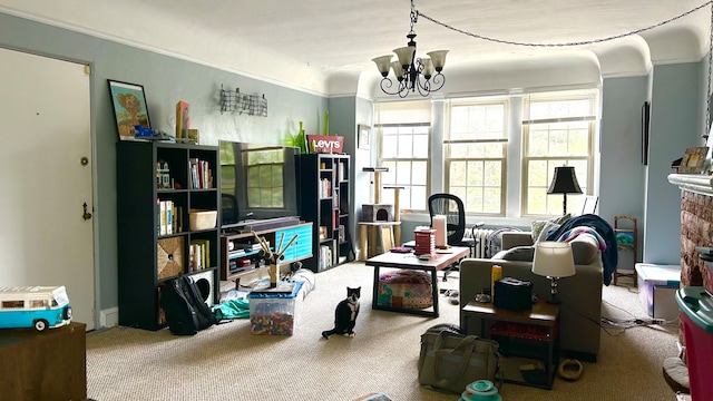 miscellaneous room with crown molding, a notable chandelier, and carpet floors