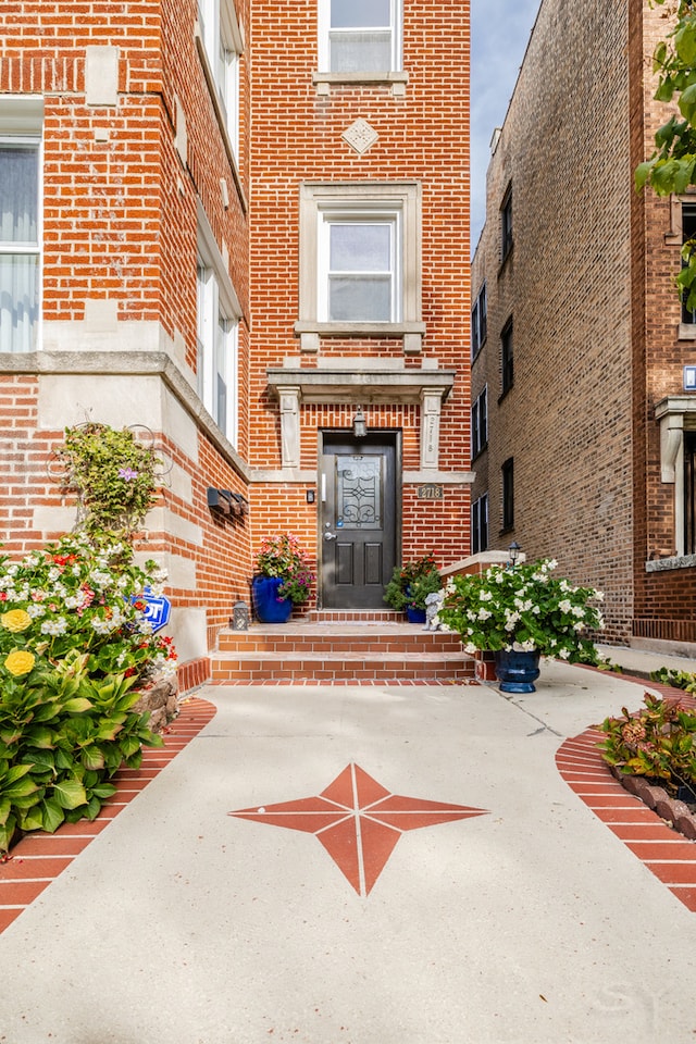 doorway to property featuring a patio