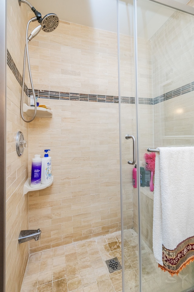 bathroom featuring an enclosed shower