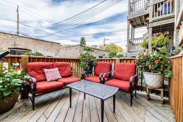 wooden deck with an outdoor hangout area