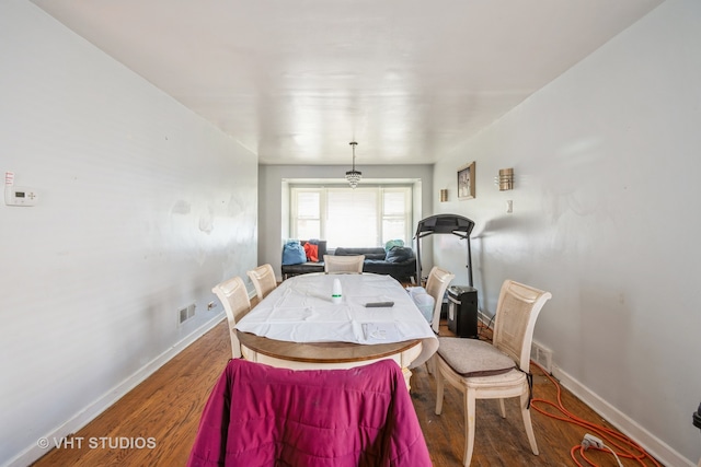 dining room featuring hardwood / wood-style flooring