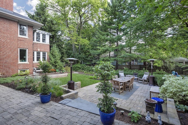 view of patio / terrace with fence and outdoor dining area