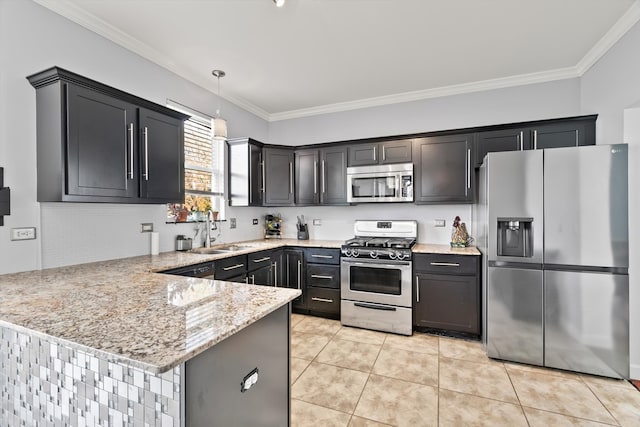 kitchen featuring pendant lighting, stainless steel appliances, ornamental molding, and sink