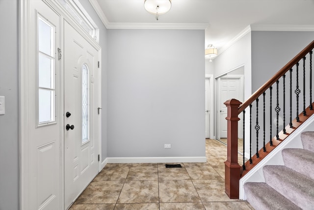 tiled entryway with ornamental molding