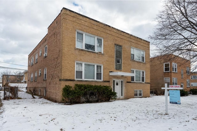 view of snow covered building