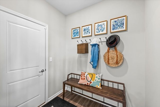 mudroom with hardwood / wood-style floors