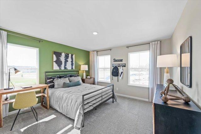 384 W Point Cir, Algonquin, IL 60102 - bedroom with carpet floors, baseboards, and an office area